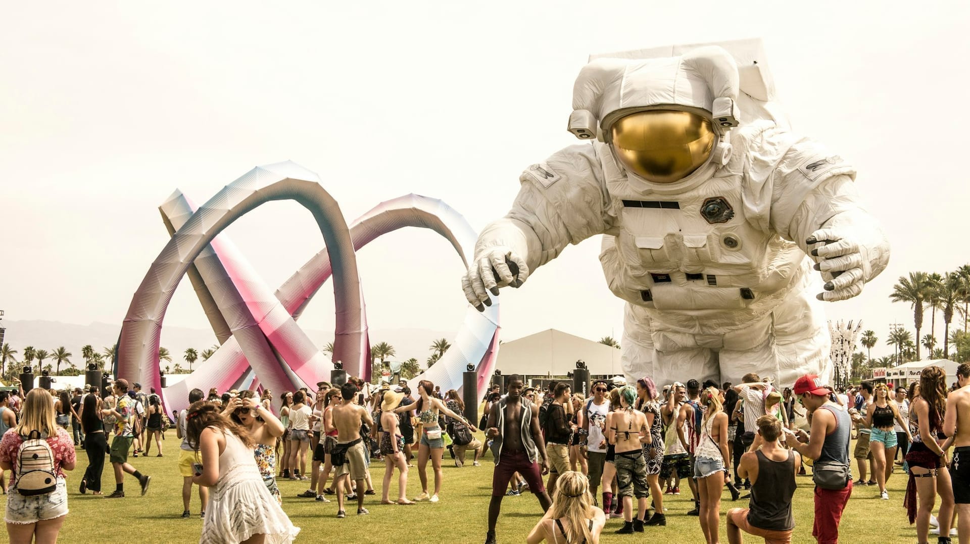 Coachella festival crowd at sunset