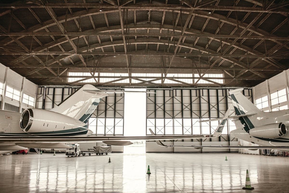 Jets stacked in an FBO hangar