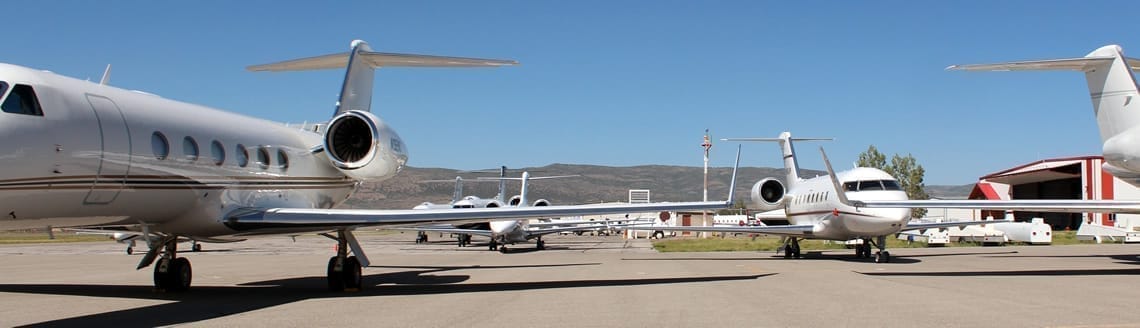 Eye-level view of a business jet on a working ramp