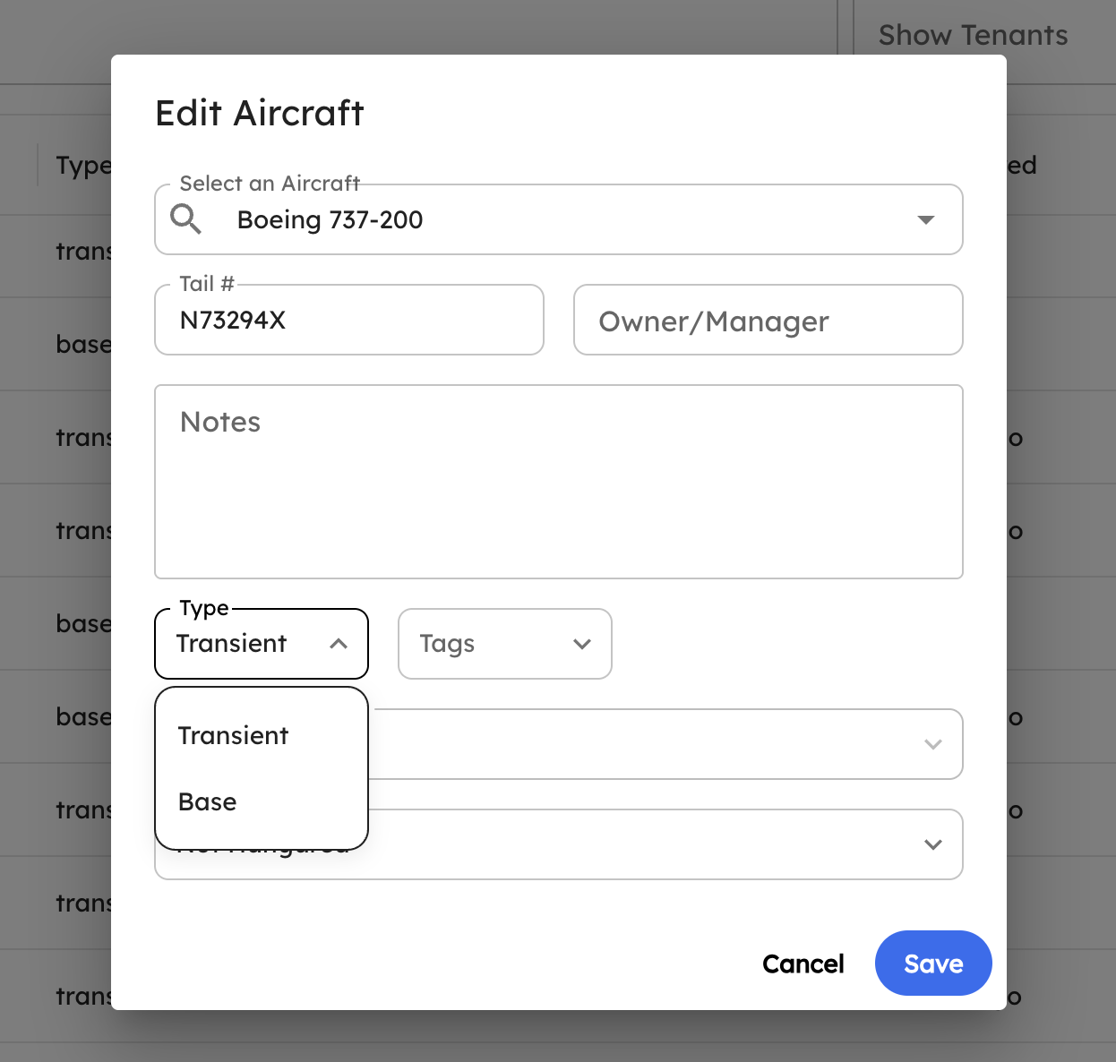 Inline tenant dropdown open on a row in the aircraft list