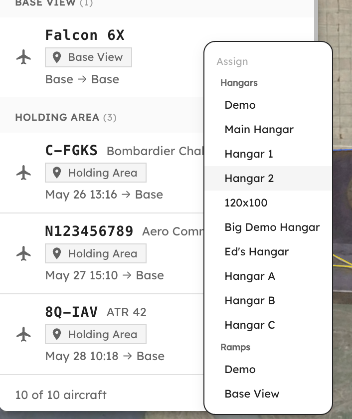 Holding Area panel with unassigned aircraft and the Assign dropdown open